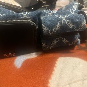 Michael Kors Indigo Denim Logo Waist Bag with Black Trim. Gently used very clean